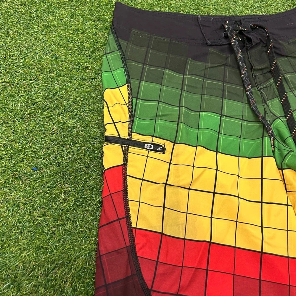ONeill Hyperfreak Men Board Short Size 31 Rasta Green Yellow Red Grid Swim Trunk